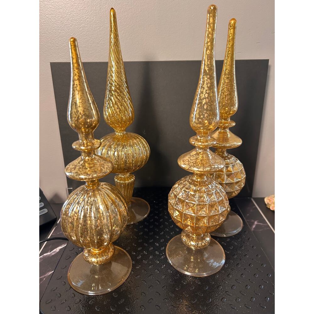 Four gold mercury glass finial decorations